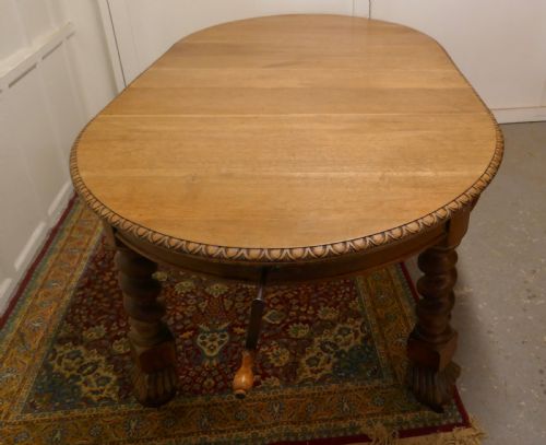 fig 3. A Large Victorian Golden Oak Oval Extending Dining Table