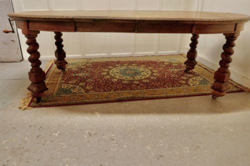fig 4. A Large Victorian Golden Oak Oval Extending Dining Table