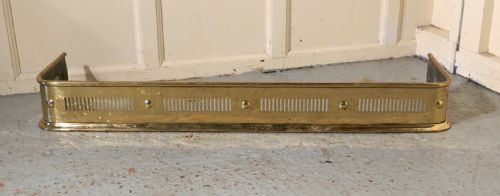 fig 2. Long Victorian Pierced Brass Fender