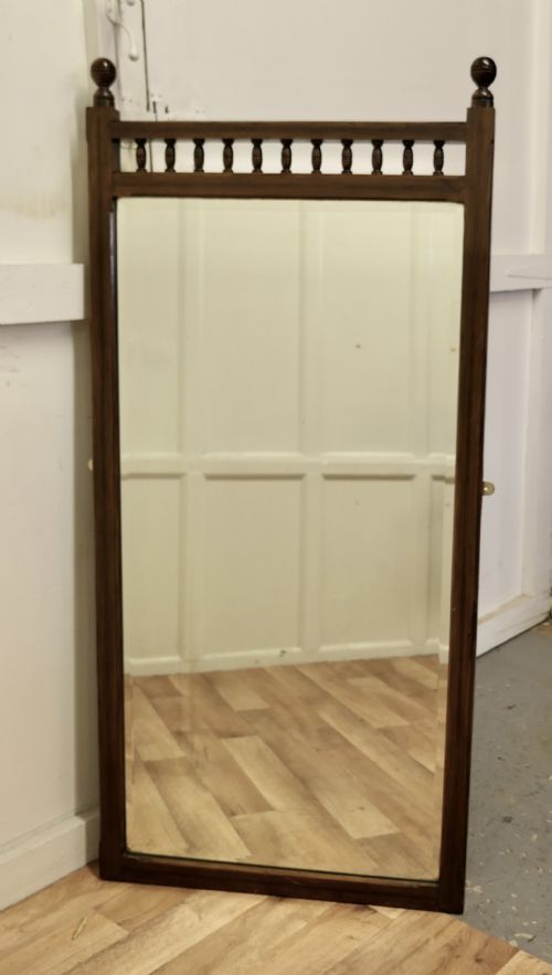 A Tall Walnut Arts and Crafts Dressing Mirror