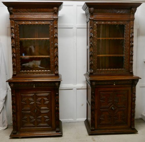 A Pair of French Carved Gothic Oak Bookcases