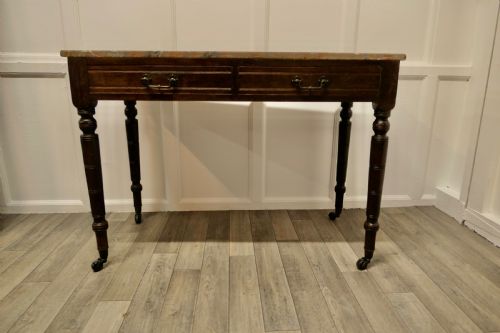 An Elegant Edwardian Pine Writing Table by Shoolbred