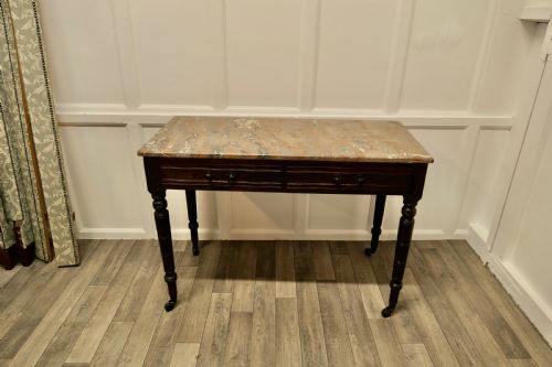fig 1. An Elegant Edwardian Pine Writing Table by Shoolbred