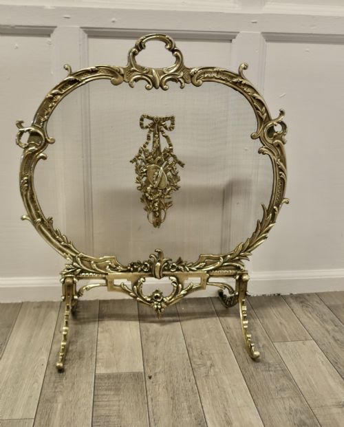 A Superb French Brass Rococo Fire Guard, Spark Screen
