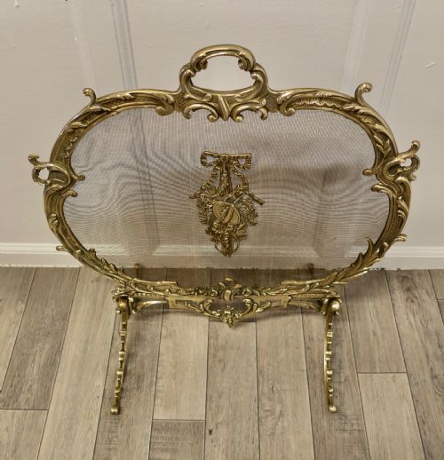 fig 1. A Superb French Brass Rococo Fire Guard, Spark screen