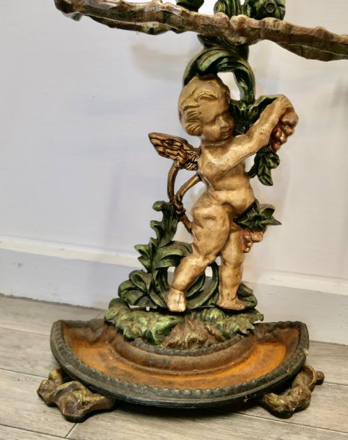 fig 1. Cast Iron Cherub Umbrella or Stick Stand