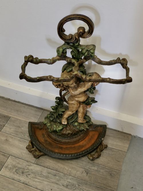 fig 2. Cast Iron Cherub Umbrella or Stick Stand