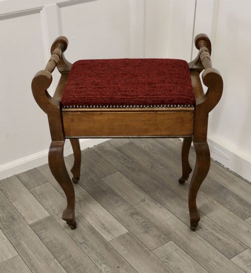 fig 1. An Edwardian Walnut Piano Stool