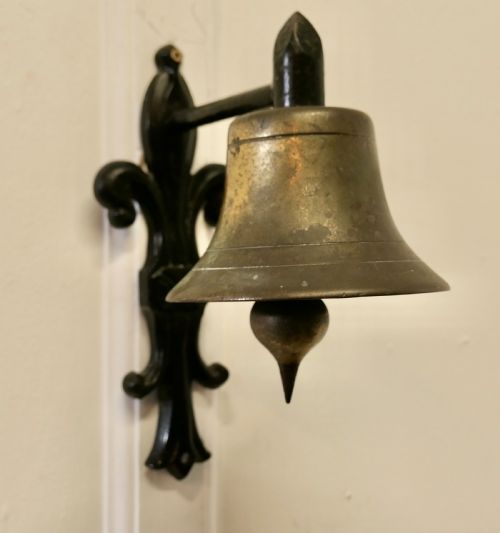Brass Bell on a Cast Iron Bracket