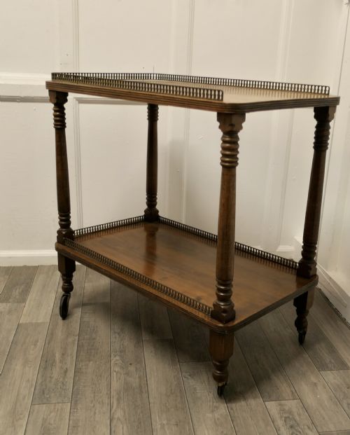 A Superb Walnut 2 Tier Tea Trolley, with Brass Galleries
