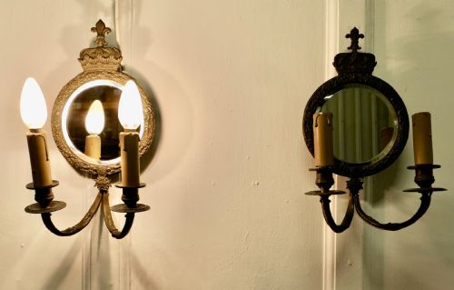 A Pair of Round Brass Girandole Wall Mirrors, in a Regal Design