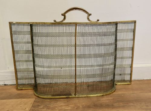 A Victorian Bowed Brass  Fire Guard