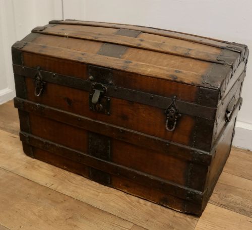 A Large Polished Oak and Pine Dome Top Chest