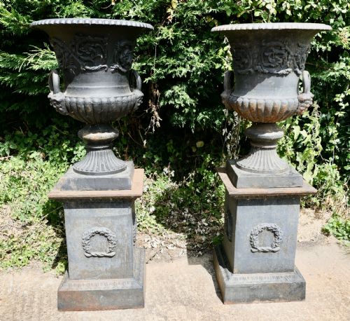 fig 1. A Pair of Large Cast Iron Urns, Garden Planters on Plinths