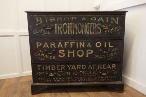 fig 1. Painted Pine Chest of Drawers, Advertising Bishop and Cain Ironmongers