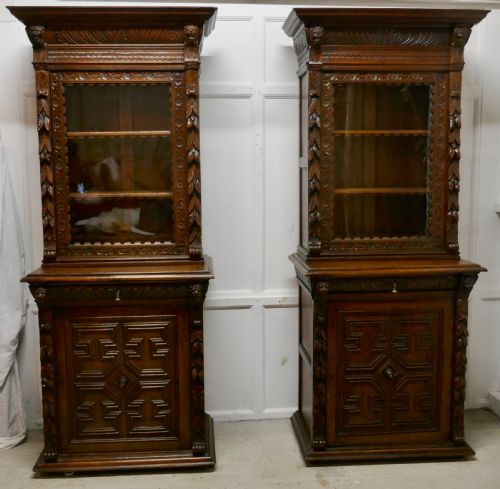 A Pair of French Carved Gothic Oak Bookcases