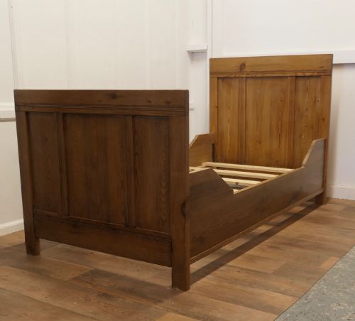 A 19th Century French Rustic Pine Single Sleigh Bed