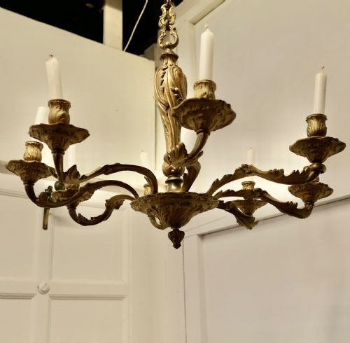 A French Gilded Brass 8 Branch Rococo Chandelier (Candelier)
