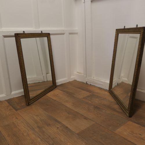 A Pair of Large Gilt Mirrors