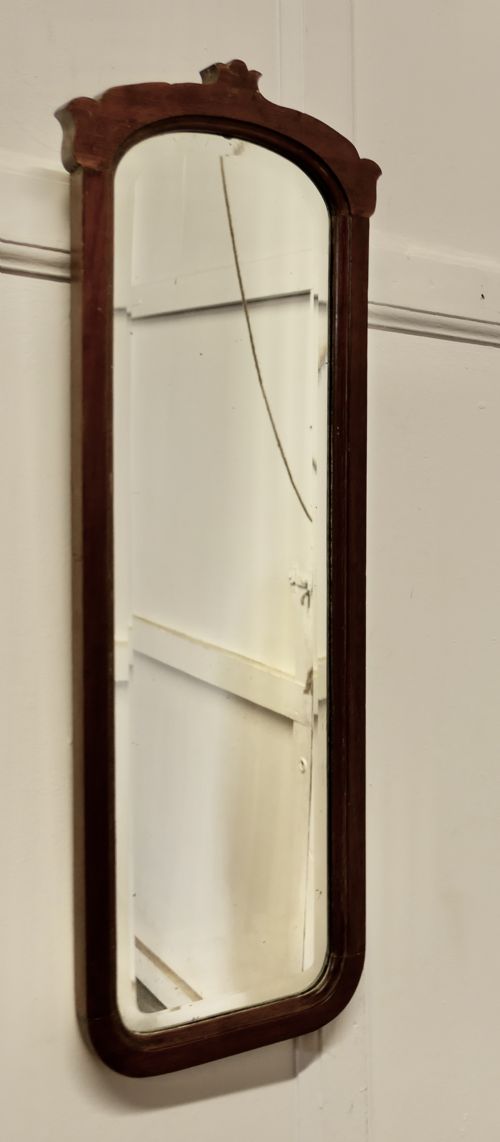 A Tall Wall Mirror, with an Arts and Crafts Frame