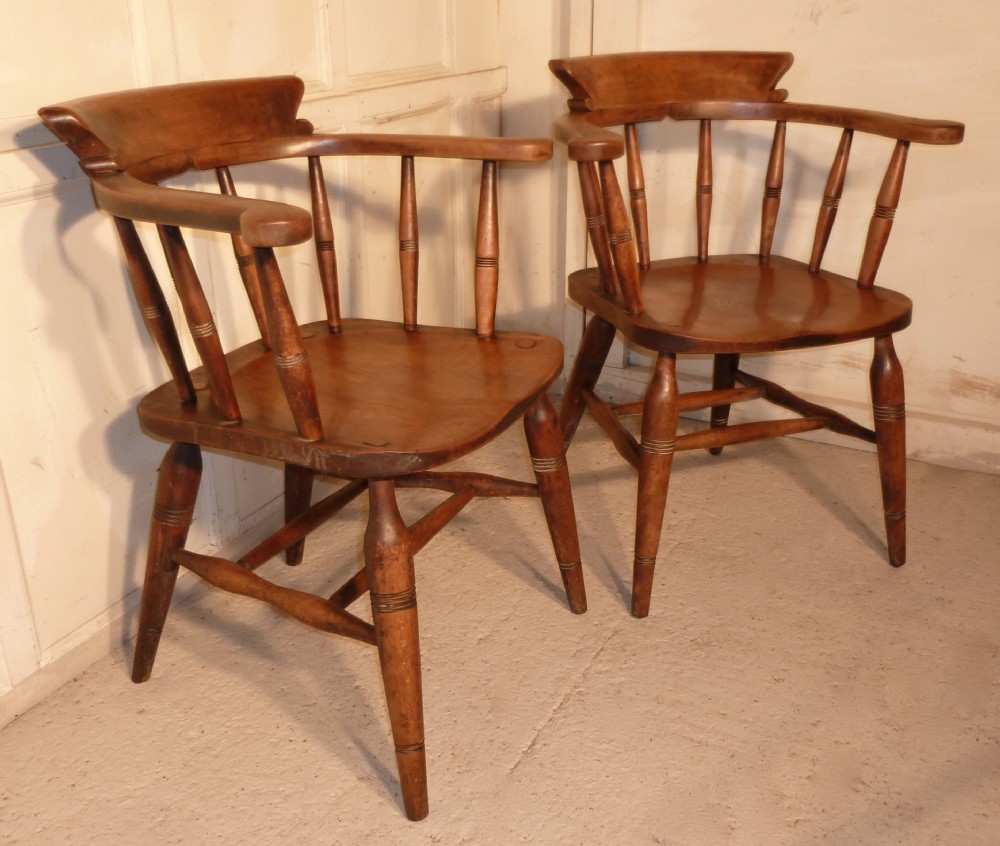 A Pair of Elm Smokers Bow Office or Desk Chairs