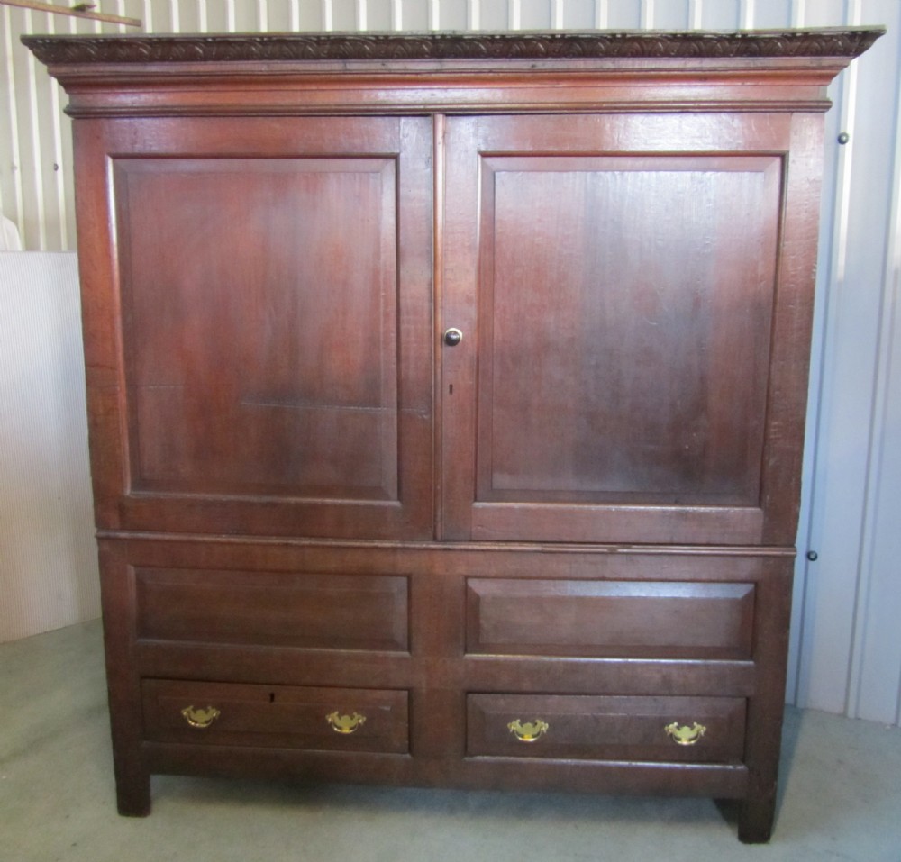 A Large 18th Century Oak Housekeepers or Cloakroom Cupboard