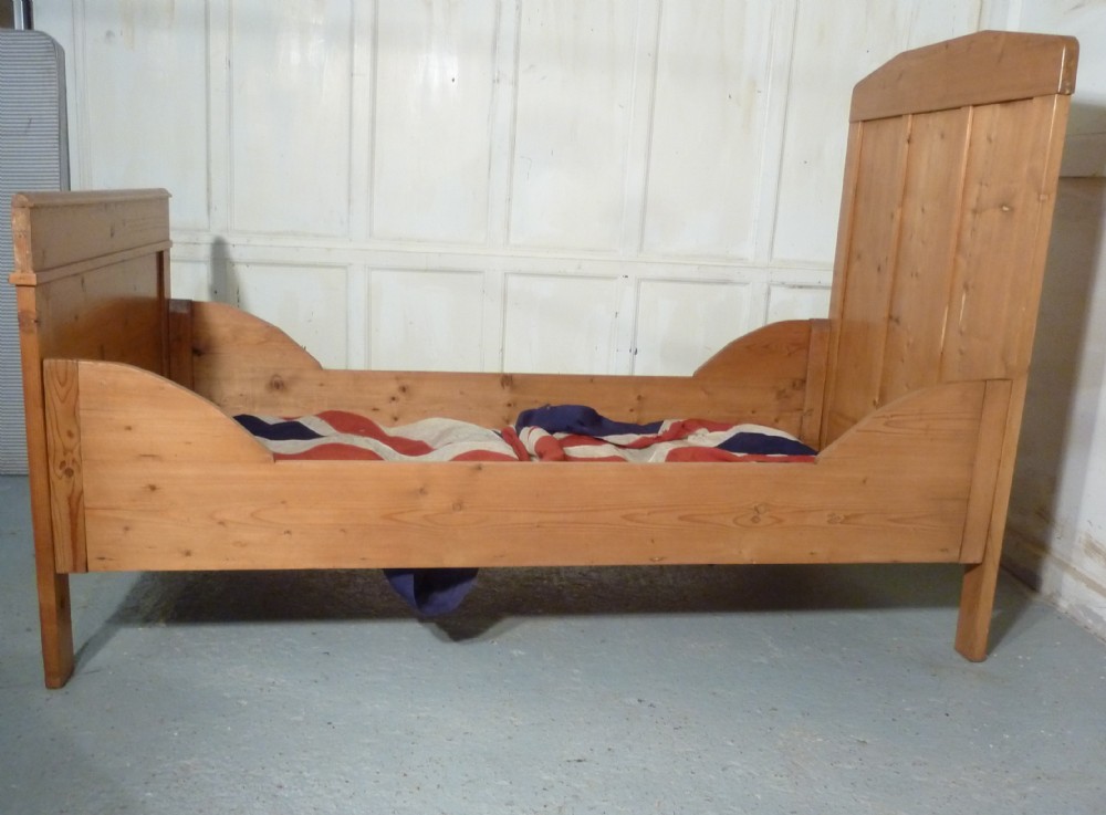 A 19th Century French Rustic Pine Single Sleigh Bed