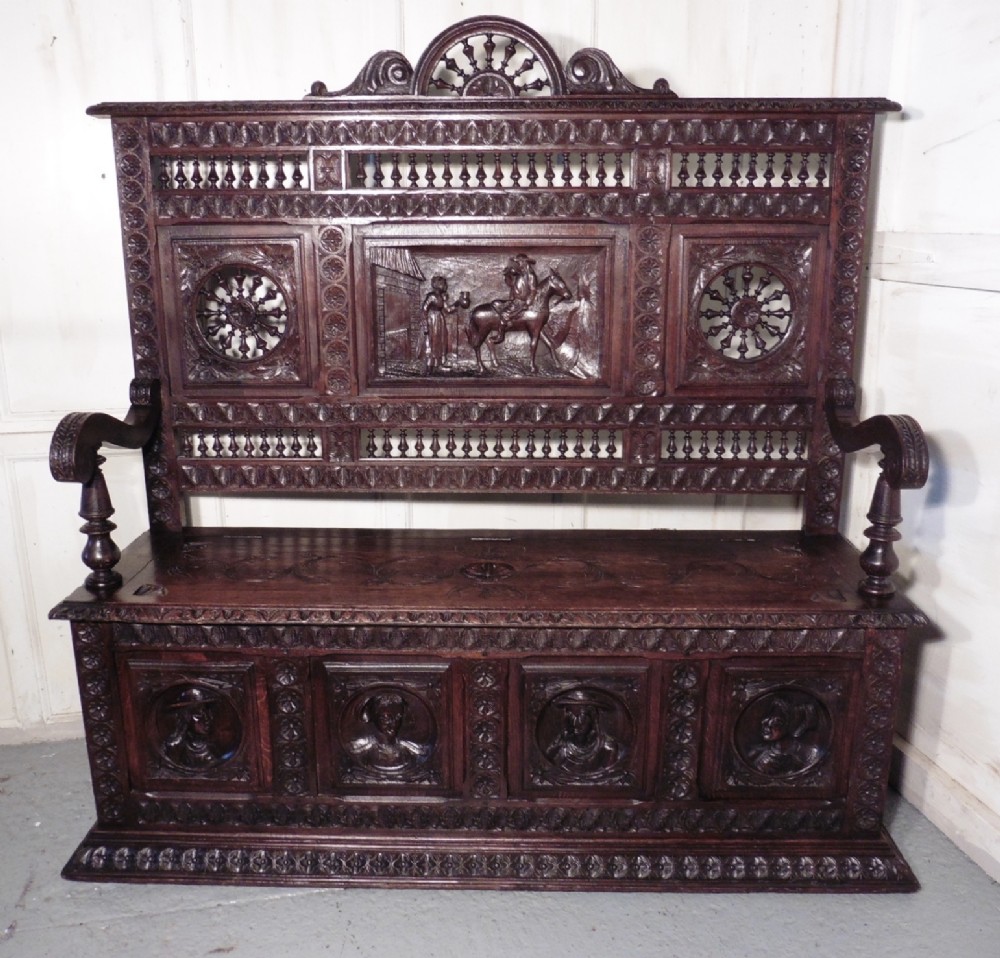A Breton High Back Carved Oak Box Settle