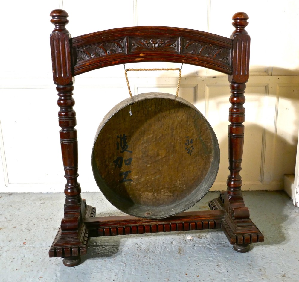 A Large Gothic Carved Oak and Brass Dinner Gong View V