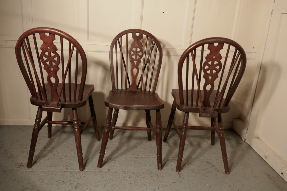 A Set of 4 Victorian Beech & Elm Wheel Back Windsor Kitchen Dining Chairs View III