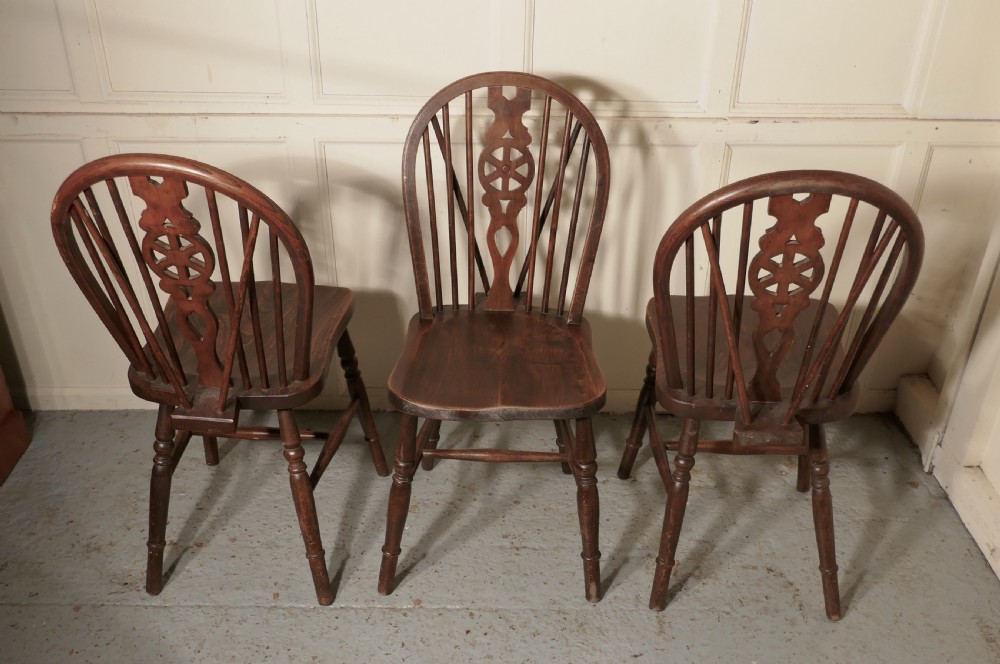 A Set of 4 Victorian Beech & Elm Wheel Back Windsor Kitchen Dining Chairs View IV