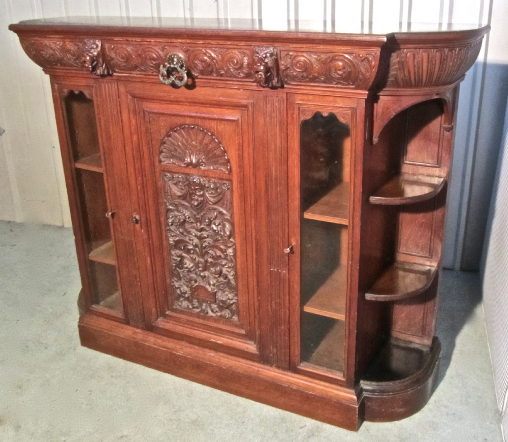A Gothic Arts and Crafts Carved Golden Oak  Sideboard by Gillows 1870 View II
