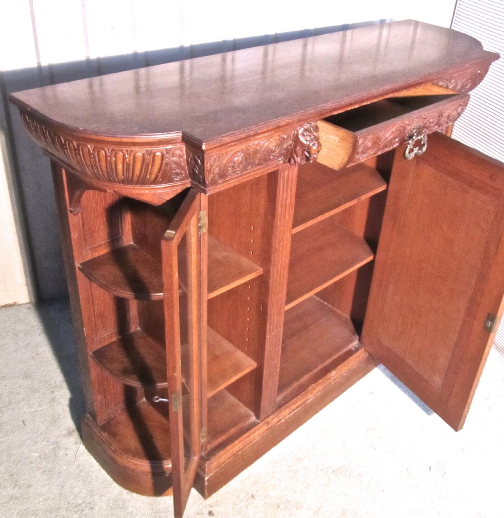 A Gothic Arts and Crafts Carved Golden Oak  Sideboard by Gillows 1870 View V
