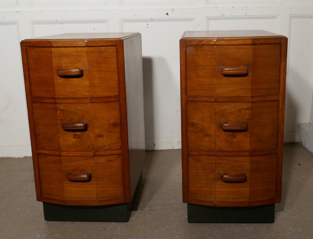 A Pair of Figured Walnut Art Deco Bedside Drawer Cabinets