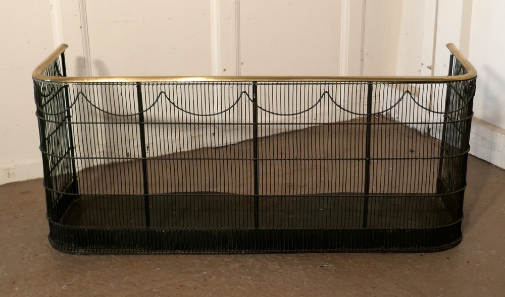A Georgian Brass and Iron Club Fender or Nursery Fire Guard View V