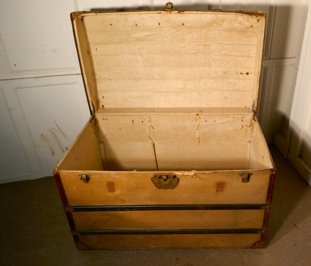 A Large 19th Century French Canvas Dome Top Travel Trunk, Lion Brand View IV