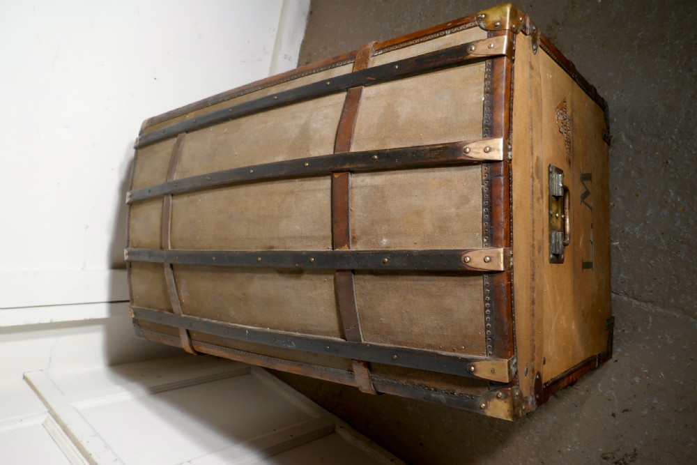 A Large 19th Century French Canvas Dome Top Travel Trunk, Lion Brand View VIII
