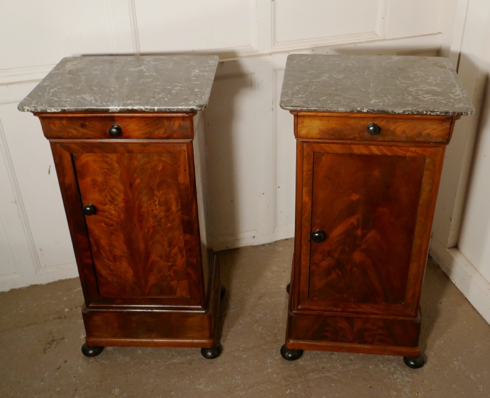 A Pair of Figured Mahogany Bedside Cupboards View II