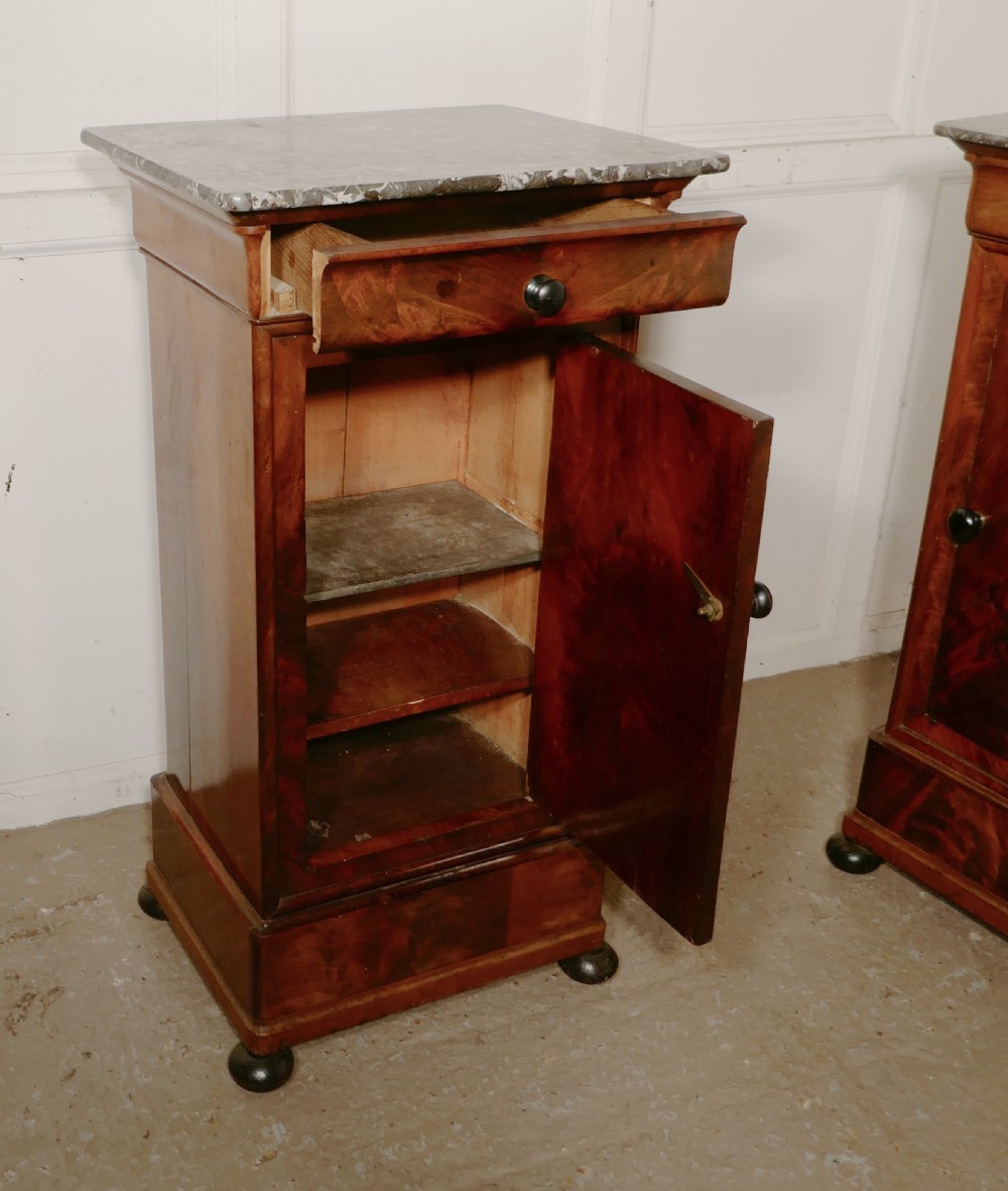 A Pair of Figured Mahogany Bedside Cupboards View V