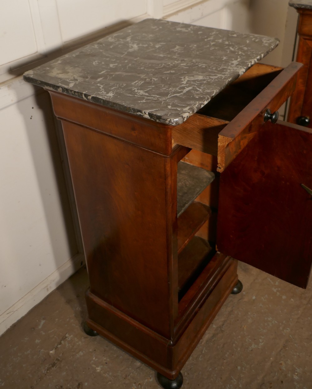 A Pair of Figured Mahogany Bedside Cupboards View VI