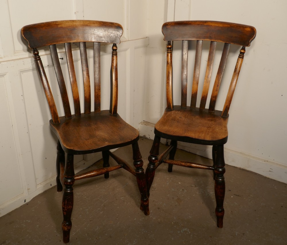A pair of Victorian Beech & Elm Splat Back Chairs
