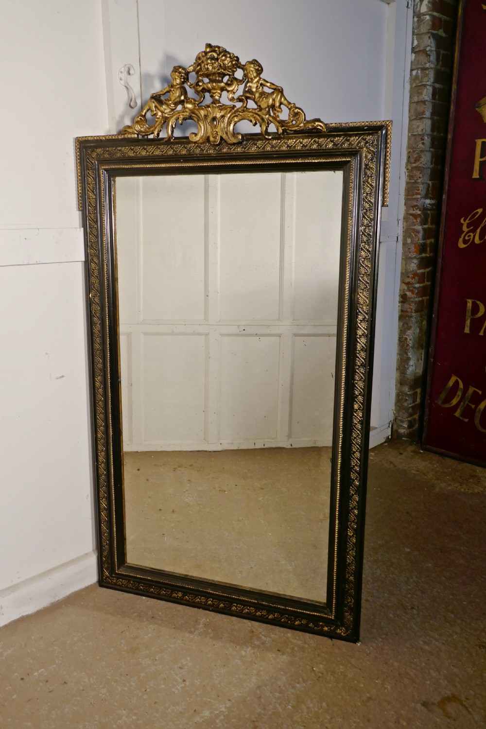 Large French Ebonised and Gilt Wall Mirror, Reclining Cherubs Crest  View VII