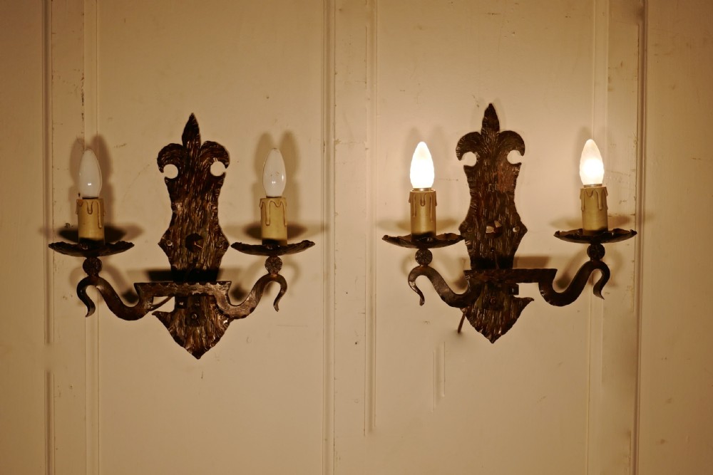 A Superb pair of French Arts and Crafts Gothic Iron Wall Lights 