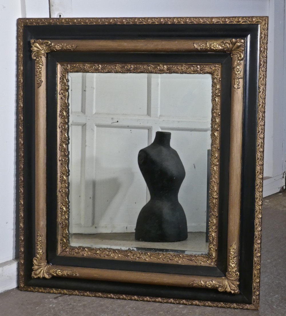 A Large Victorian Gilt and Ebonised Wall Mirror View VI