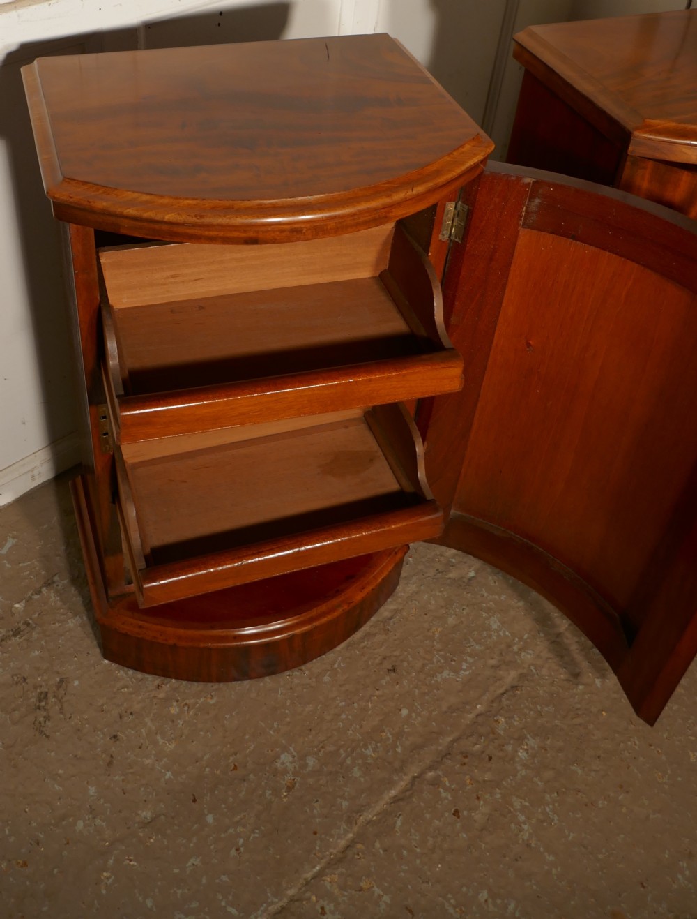 A pair of Victorian Flame Mahogany Pedestal Bedside Cabinets View III