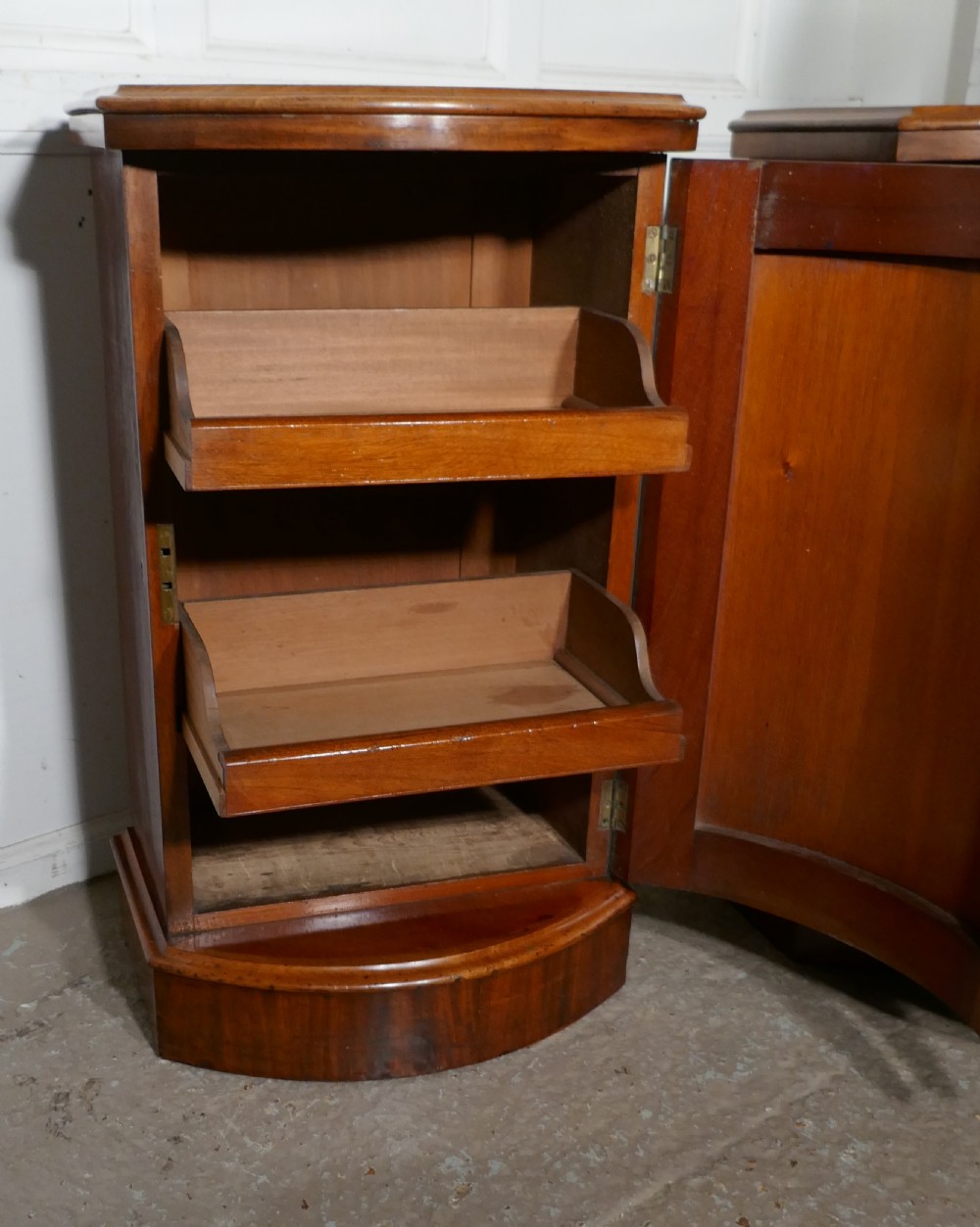 A pair of Victorian Flame Mahogany Pedestal Bedside Cabinets View IV