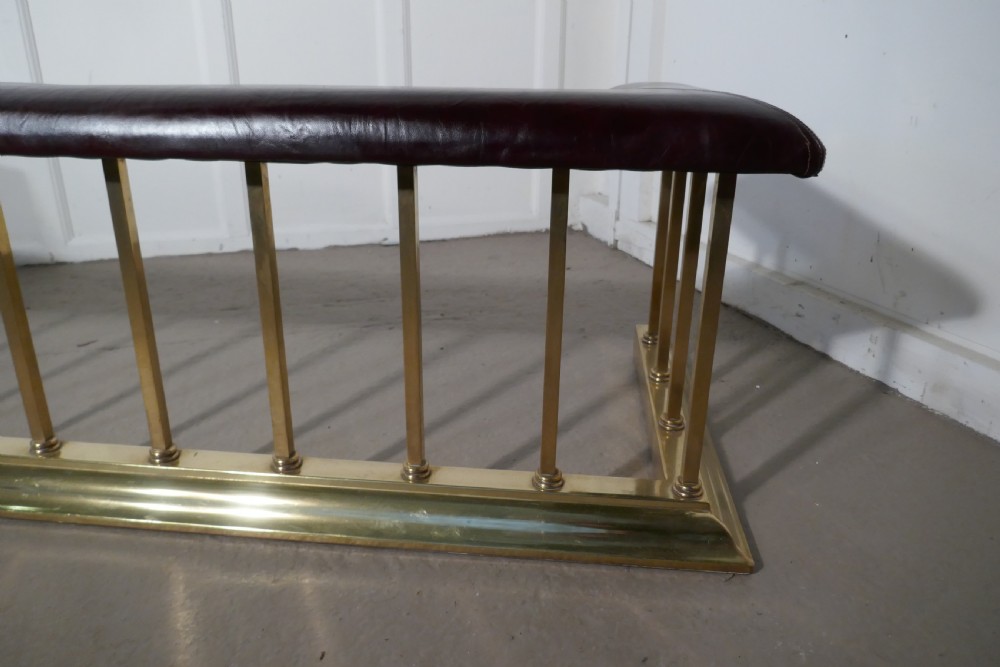 A Large Brass and Leather Club Fender View IV