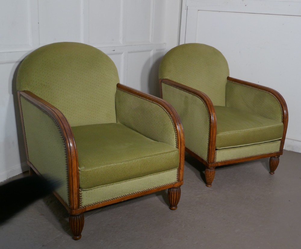 A Pair of French Art Deco Walnut Upholstered Club Chairs