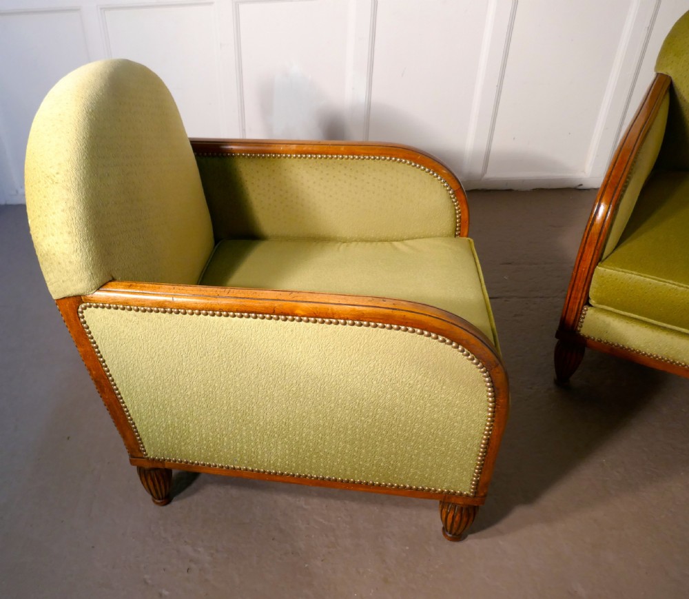A Pair of French Art Deco Walnut Upholstered Club Chairs View XI