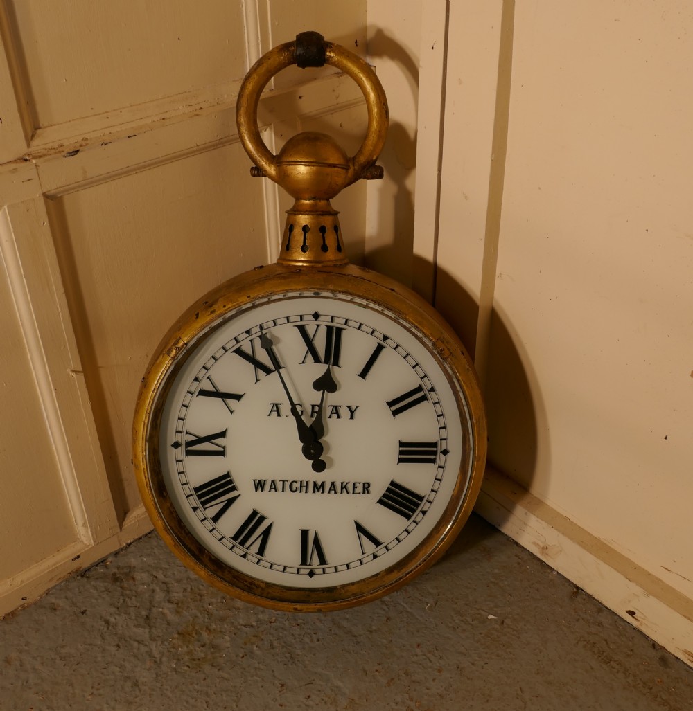 A Watch Makers Shop Trades Sign, Giant Pocket Watch View IX